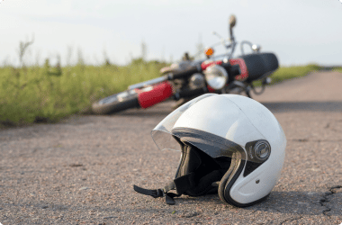 motorcycle turned over on side of road following accident - motorcycle accident lawyer