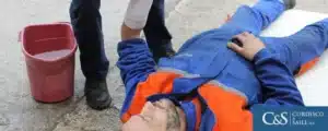 An injured man lying on the floor
