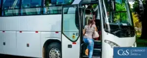 passengers getting off a bus