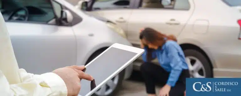 man on phone after car accident