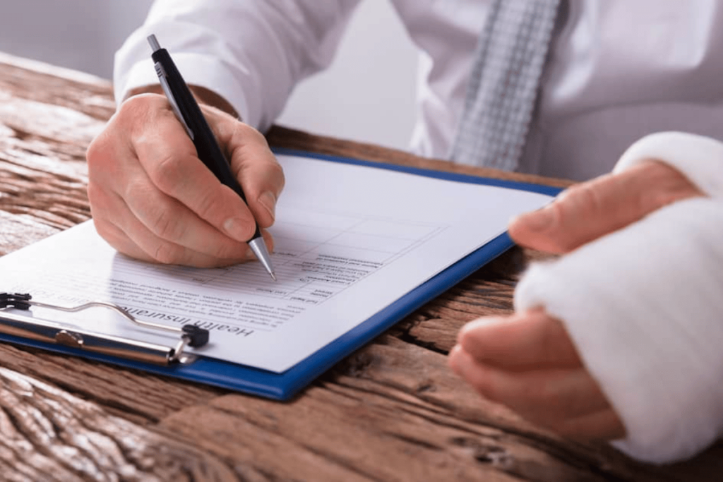 Injured worker filling out form