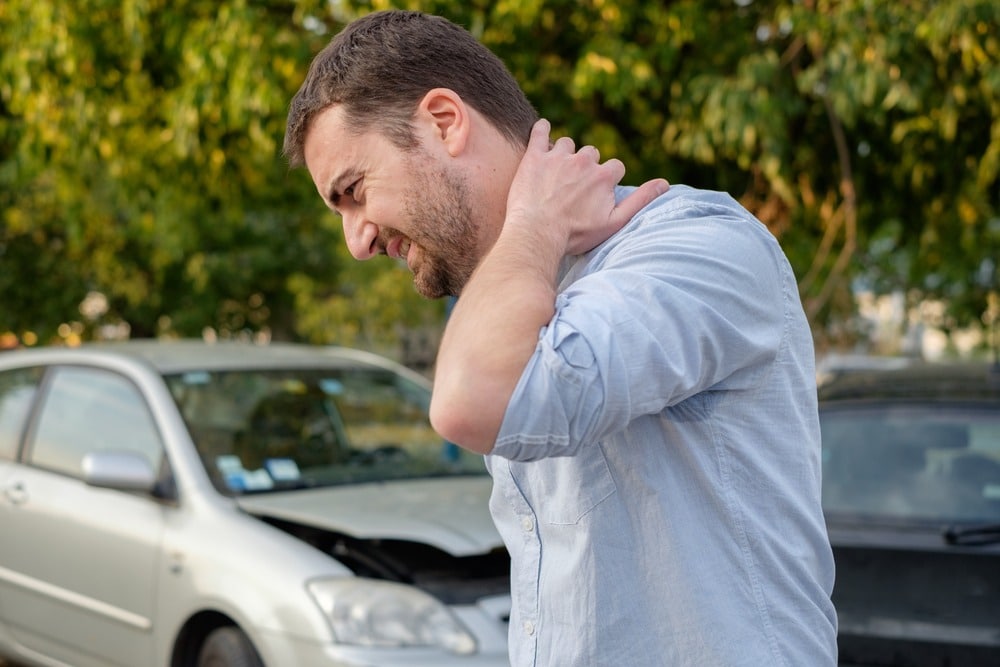 man with injured neck after car accident