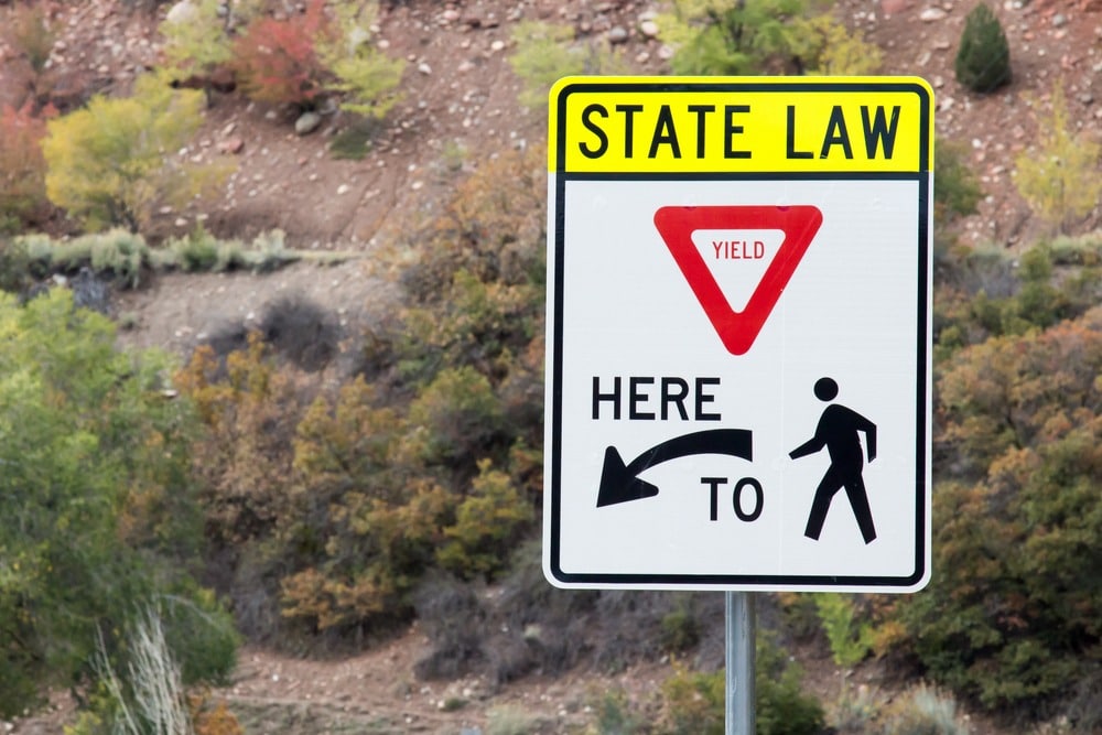 state law sign for yielding to pedestrians