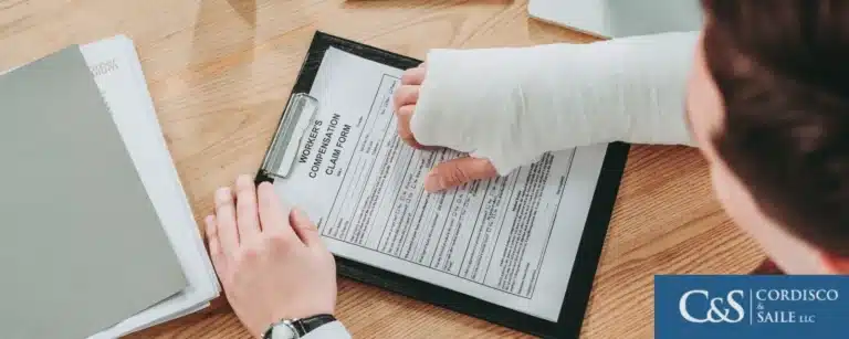 Injured worker filling out a form