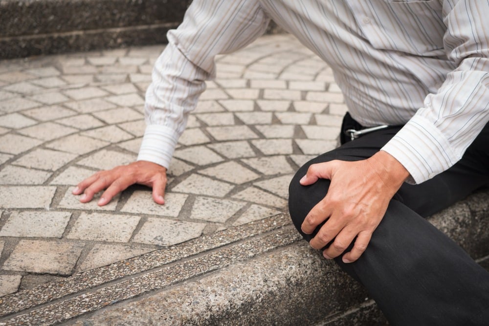 man injured after falling on street