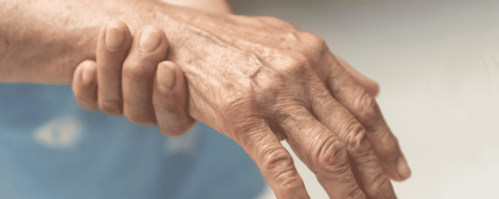 The hand of an elderly man using CRPS