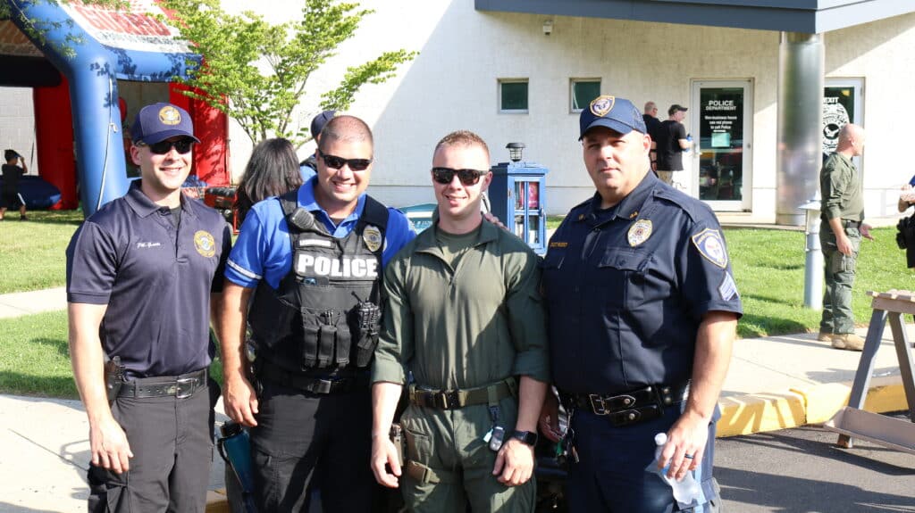Image of four police officers at the cordisco & saile community unity national night out