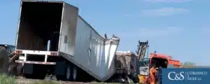 truck-overturned-on-the-side-of-the-road-after-accident