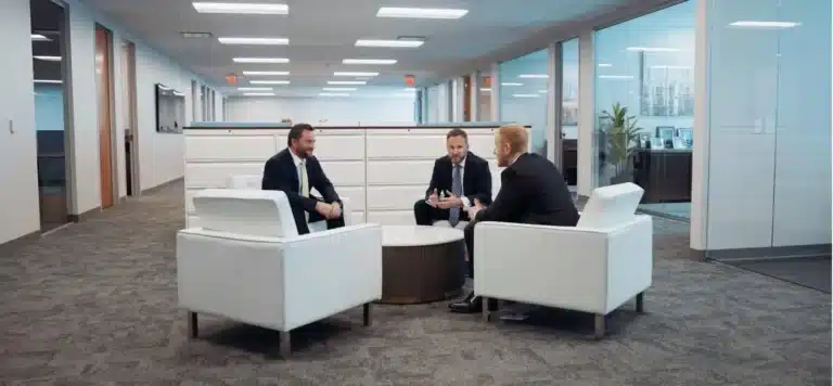 group of attorneys discussing accident details