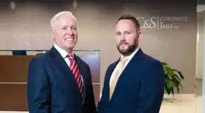 Cordisco & Saile pennsylvania personal injury lawyers standing in office