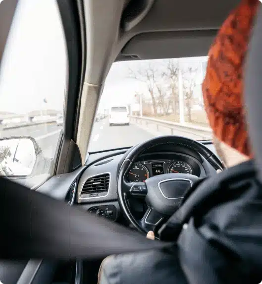 man driving on the road
