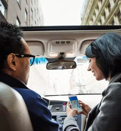 driver and passenger navigating on road