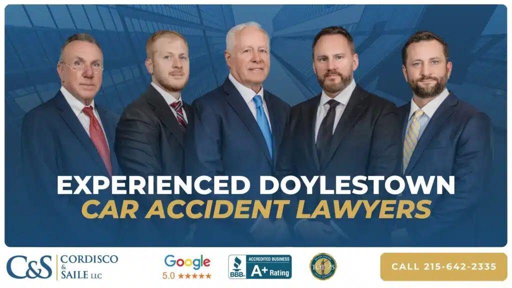 doylestown car accident lawyers pictured with awards