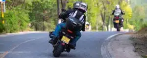 people-riding-motorcycles-and-driving-on-road