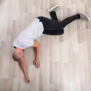 person lying on the floor after fall